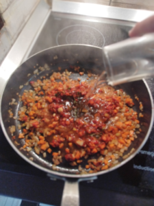 Deglazing with white wine-- the-sauce-lab.com