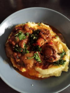 Serve the finished dish over potatoes puree and drizzle a little bit of Chimichurri sauce. Enjoy!